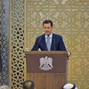 Tổng thống Syria Bashar al-Assad tuyên bố không từ chức trước sức ép của Phương Tây. (Ảnh: AFP/TTXVN)