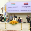 Lễ ký biên bản ghi nhớ hợp tác giữa hai nước Campuchia và Ấn Độ. (Ảnh: Xuân Khu/Vietnam+)