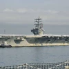 Tàu sân bay USS Ronald Reagan neo đậu tại căn cứ Hải quân Yokosuka. (Ảnh: Kyodo)