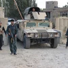 Lực lượng an ninh Afghanistan làm nhiệm vụ trong cuộc giao tranh với phiến quân Taliban gần sân bay ở ngoại ô thành phố Kunduz ngày 29/9. (Ảnh: AFP/TTXVN)