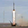 Tên lửa đẩy mang theo tàu vận tải Progress M-29M rời bệ phóng tại sân bay vũ trụ Baikonur. (Ảnh: AFP/TTXVN)