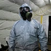 Chuyên gia của Liên hợp quốc tham gia quá trình tiêu hủy kho vũ khí hóa học tại Syria. (Ảnh: AP)