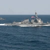 Tàu khu trục tên lửa Mỹ USS Lassen thực hiện tuần tra trong khu vực 12 hải lý thuộc đảo nhân tạo mà Trung Quốc xây dựng trái phép trên khu vực quần đảo Trường Sa của Việt Nam. (Ảnh: atimes.com)