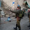 Một thanh niên Palestine bị bắn chết sau khi cố dùng dao tấn công một binh sỹ Israel tại thành phố Hebron ở Bờ Tây ngày 29/10. (Ảnh: AFP/TTXVN)