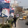 Tấm poster treo tại khu Bờ Tây với nội dung nói Tổng thống Mỹ đừng mang điện thoại tới Ramallah vì ở đây không có mạng 3G. (Nguồn: timesofisrael.com)