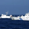 Tàu bảo vệ bờ biển của Nhật Bản và Tàu hải giám của Trung Quốc. (Nguồn: snipthepix.com)