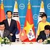 Lễ ký Bản thỏa thuận kết thúc đàm phán FTA Việt Nam-Hàn Quốc. (Ảnh: Đức Tám/TTXVN)