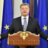 Tổng thống Ukraine Petro Poroshenko phát biểu trong một cuộc họp báo ở thủ đô Kiev. (Ảnh: AFP/TTXVN) 