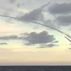 Tàu ngầm Nga phóng tên lửa hành trình vào mục tiêu IS. (Ảnh: AFP)