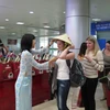 Du khách Nga tại Cảng hàng không quốc tế Cam Ranh, Khánh Hòa. (Ảnh: TTXVN)