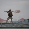 Lực lượng đặc nhiệm Afghanistan trong chiến dịch tấn công các đối tượng gần Sứ quán Ấn Độ. (Ảnh: AFP)