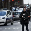 Cảnh sát Pháp tuần tra tại Paris sau vụ nổ súng ngày 7/1. (Ảnh: AFP/TTXVN)