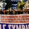 Hàng nghìn người dân Hy Lạp biểu tình phản đối chính sách khắc khổ của chính phủ hôm 15/12. (Ảnh: AFP/TTXVN)