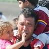 Người tị nạn Syria tại biên giới Hungary-Serbia. (Nguồn: ZUMA Press)