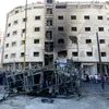 Hiện trường vụ đánh bom kép tại thủ đô Damascus của Syria. (Ảnh: AFP/TTXVN)