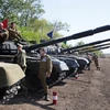 Lực lượng ly khai ở miền đông Ukraine tham gia cuộc tập trận tại thị trấn Torez, khu vực Donetsk ngày 24/9. (Ảnh: AFP/TTXVN)