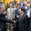 Chủ tịch nước Trương Tấn Sang tiếp Tổng thư ký Liên hiệp Công đoàn Thế giới George Mavrikos. (Ảnh: Nguyễn Khang/TTXVN)