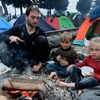 Trẻ em trong những căn lều tạm tại Idomeni, Hy Lạp, gần biên giới với Macedonia ngày 10/3. (Nguồn: AFP/TTXVN)
