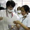 Một nữ y tá nước ngoài làm việc tại bệnh viện Nhật Bản. (Nguồn: japantimes.co.jp)