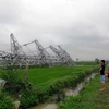 Cột điện trên đường dây 500 kV Quảng Ninh-Hiệp Hòa bị đổ. (Ảnh: Việt Hùng/TTXVN)