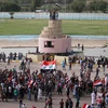 Người biểu tình tràn vào khu vực Vùng Xanh ở Baghdad, Iraq ngày 1/5. (Nguồn: AFP/TTXVN)