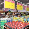 Khách hàng mua sắm tại siêu thị Saigon Co.op. (Nguồn: TTXVN)