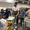Người dân mua nhu yếu phẩm tại một siêu thị ở Auckland, New Zealand ngày 28/2/2020. (Ảnh: THX/TTXVN)