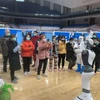 Robot Cloud Ginger hướng dẫn các bệnh nhân vận động tại bệnh viện Vũ Hán, Trung Quốc. (Nguồn: CloudMinds)