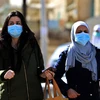 Người dân đeo khẩu trang phòng lây nhiễm COVID-19 tại Amman, Jordan ngày 24/3/2020. (Ảnh: THX/TTXVN)