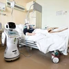 Một loại robot hỗ trợ các bệnh nhân mắc COVID-19. (Nguồn: Reuters)