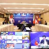 Phó Thủ tướng, Bộ trưởng Bộ Ngoại giao Phạm Bình Minh chủ trì Hội nghị trực tuyến Hội đồng Chính trị - An ninh ASEAN lần thứ 21. (Ảnh: Văn Điệp/TTXVN)