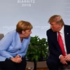 Thủ tướng Đức Angela Merkel trong cuộc gặp Tổng thống Mỹ Donald Trump bên lề Hội nghị thượng đỉnh Nhóm các nước công nghiệp phát triển hàng đầu thế giới (G7) tại Biarritz, Tây Nam Pháp ngày 26/8/2019. (Ảnh: AFP/TTXVN)