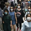 Người dân đeo khẩu trang phòng lây nhiễm COVID-19 tại Seoul, Hàn Quốc, ngày 23/6/2020. (Ảnh: AFP/TTXVN)