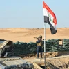 Lực lượng an ninh Iraq trong chiến dịch truy quét các phần tử IS tại Salaheddine, gần biên giới với Syria. (Ảnh: AFP/TTXVN)