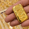 Vàng miếng được bán tại cửa hàng ở Dubai, Các tiểu vương quốc Arab thống nhất (UAE), ngày 29/7/2020. (Ảnh: AFP/TTXVN)