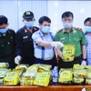 Các lực lượng phối hợp thực hiện chuyên án A720P – triệt phá đường dây mua bán, vận chuyển trái phép chất ma túy từ thành phố sang Hàn Quốc. (Ảnh: Thanh Vũ/TTXVN)