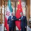 Ngoại trưởng Trung Quốc Vương Nghị và người đồng cấp Iran Javid Zarif. (Nguồn: socialnews.xyz)