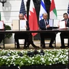 Lễ ký kết bình thường hóa quan hệ giữa Israel với UAE, Bahrain tại Nhà Trắng. (Ảnh: AFP/TTXVN)