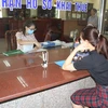 Người dân làm thủ tục tại Cục thuế tỉnh Ninh Bình. (Ảnh: Hải Yến/TTXVN)