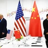 Tổng thống Mỹ Donald Trump và Chủ tịch Trung Quốc Tập Cận Bình tham dự phiên đối thoại song phương bên lề Hội nghị thượng đỉnh G20 tại Osaka, Nhật Bản ngày 29/6/2019. (Nguồn: AFP)