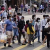 Người dân đeo khẩu trang phòng dịch COVID-19 tại Hong Kong, Trung Quốc ngày 21/11/2020. (Ảnh: THX/TTXVN)