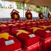 Hài cốt liệt sỹ quân tình nguyện và chuyên gia Việt Nam hy sinh trong các thời kỳ chiến tranh trên chiến trường Campuchia. (Ảnh: Hồng Đạt/TTXVN)
