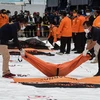 Indonesia đẩy nhanh việc nhận dạng thi thể nạn nhân vụ rơi máy bay