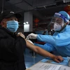 Trung Quốc khuyến khích người dân tiêm vaccine bằng phiếu giảm giá