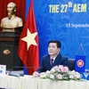 Bộ trưởng Công Thương Nguyễn Hồng Diên dẫn đầu đoàn VIệt Nam tham dự hội nghị tại điểm cầu Hà Nội. (Ảnh: Trần Việt/TTXVN)