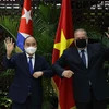 [Photo] Chủ tịch nước Nguyễn Xuân Phúc hội kiến Thủ tướng CH Cuba