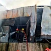 TP.HCM: Dập tắt đám cháy lớn ở kho chứa vật liệu tại huyện Bình Chánh