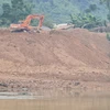 Tỉnh ủy Thanh Hóa chỉ đạo xác minh vụ đổ đất đá thải xuống sông Mã