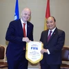 Chủ tịch nước Nguyễn Xuân Phúc: VN luôn ủng hộ các hoạt động của FIFA