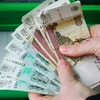 Đồng ruble Nga tiếp tục giảm giá, thấp kỷ lục so với đồng USD